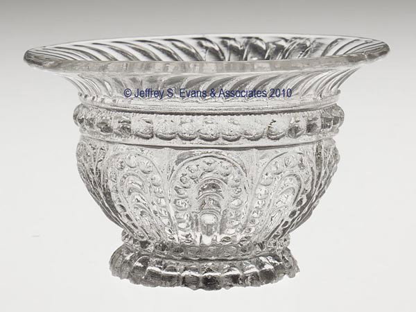RD-37 / MCKEARIN GV-24 VARIANT SIGNED SALT OR PERF: RD-37 / MCKEARIN GV-24 VARIANT SIGNED SALT OR PERFUMERY CONTAINER, colorless, flared rim, concave base embossed "R & G. A. WRIGHT / PHILADELPHIA", graphite rough pontil mark. Probably extremely rare. 