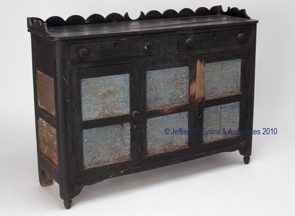 EXCEPTIONAL VIRGINIA WALNUT DIMINUTIVE 10-TIN SIDE: EXCEPTIONAL VIRGINIA WALNUT DIMINUTIVE 10-TIN SIDEBOARD SAFE long rectangular top with an applied boldly cut-out gallery, above two drawers and two doors flanking a stationary center panel, the whole 
