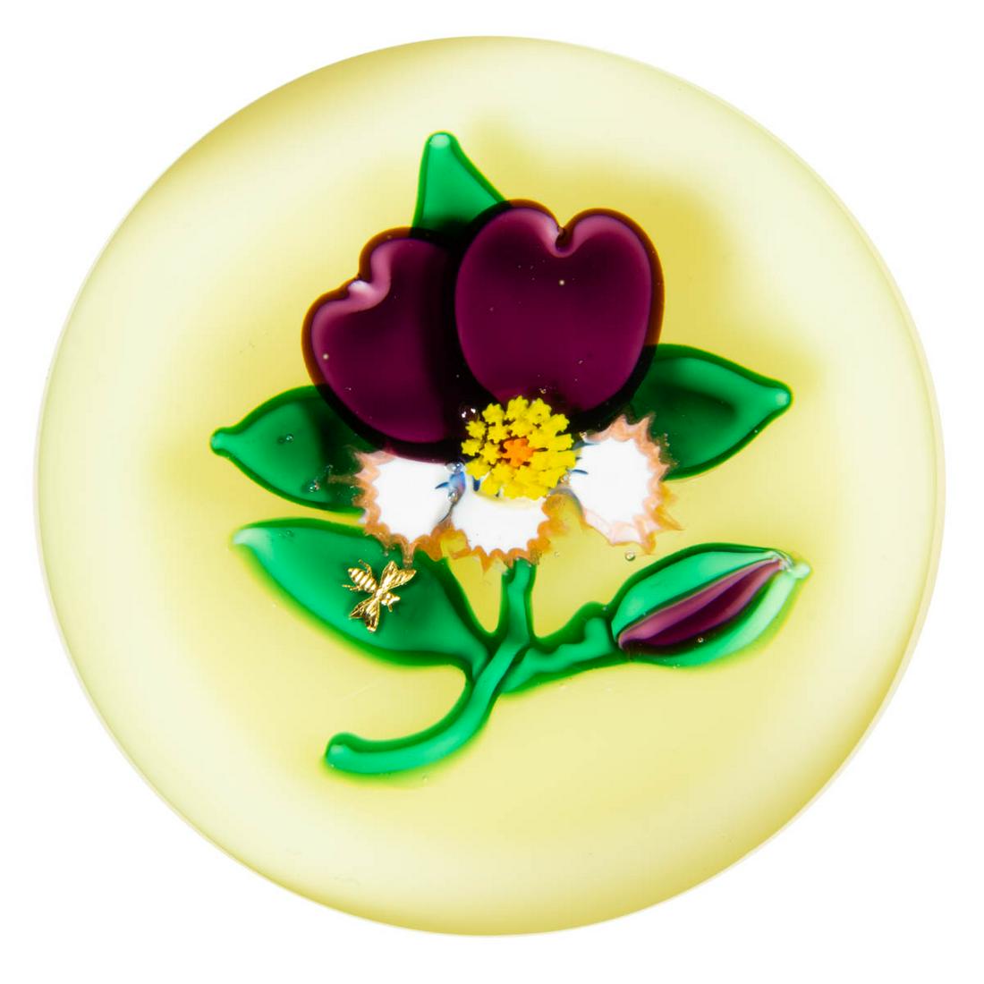 CHARLES KAZIUN JR. (AMERICAN, 1919-1992) PANSY LAMPWORK: CHARLES KAZIUN JR. (AMERICAN, 1919-1992) PANSY LAMPWORK STUDIO ART GLASS PAPERWEIGHT, the blossom having two purple petals, over three white and peach petals, yellow Stardust-type central cane, three 