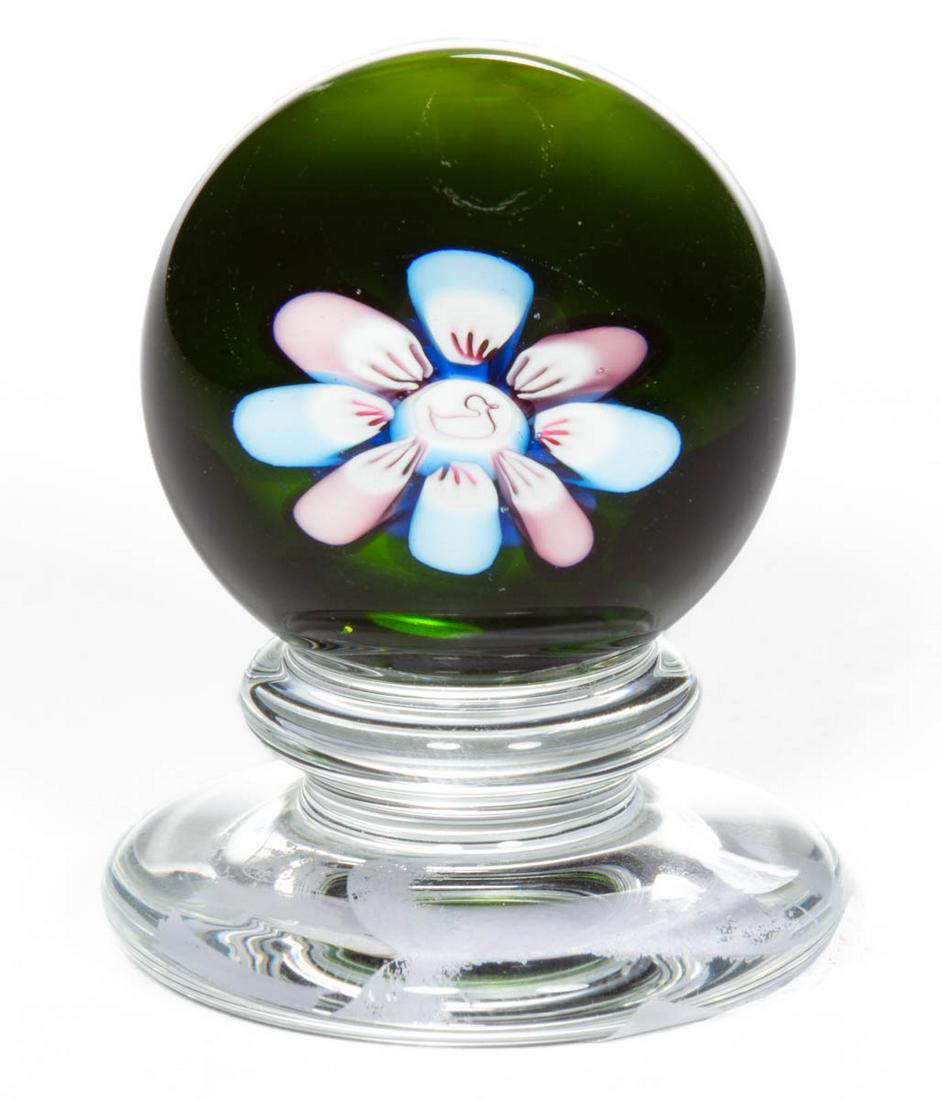 CHARLES KAZIUN JR. (AMERICAN, 1919-1992) DUCK: CHARLES KAZIUN JR. (AMERICAN, 1919-1992) DUCK MILLEFIORI STUDIO ART GLASS PEDESTAL PAPERWEIGHT, complex pink and blue cane featuring a swimming duck to the center, above a translucent green ground, ra