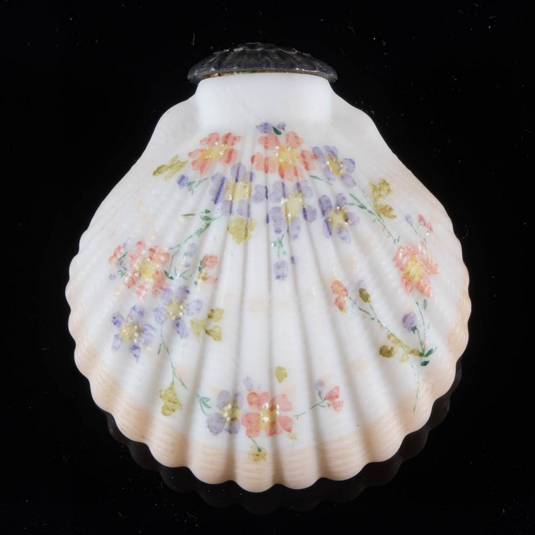 MT. WASHINGTON COCKLESHELL SALT SHAKER: MT. WASHINGTON COCKLESHELL SALT SHAKER, opaque white with peach shading and polychrome floral decoration, plush/satin finish, period lid. Mt. Washington Glass Co. Fourth quarter 19th century. 2 3/4" H