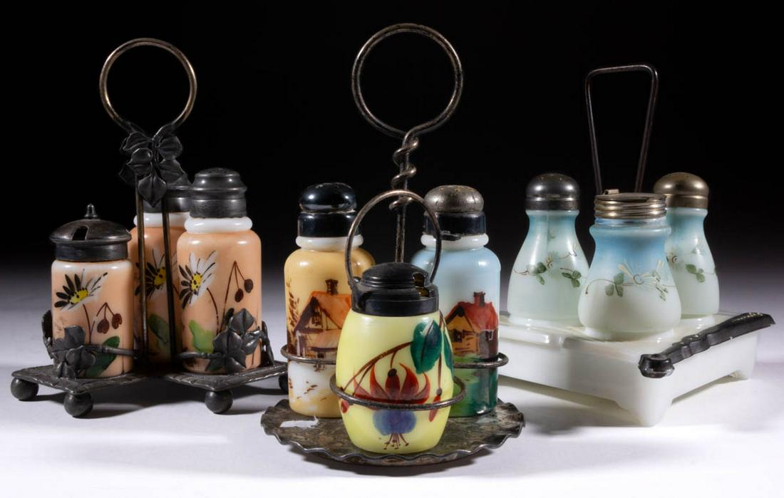 ASSORTED DECORATED OPAL GLASS CONDIMENT SETS, LOT OF: ASSORTED DECORATED OPAL GLASS CONDIMENT SETS, LOT OF THREE, opaque white with various grounds and polychrome-enamel decoration, including a Scalloped Fan set, and two fitted into quadruple-plated stan