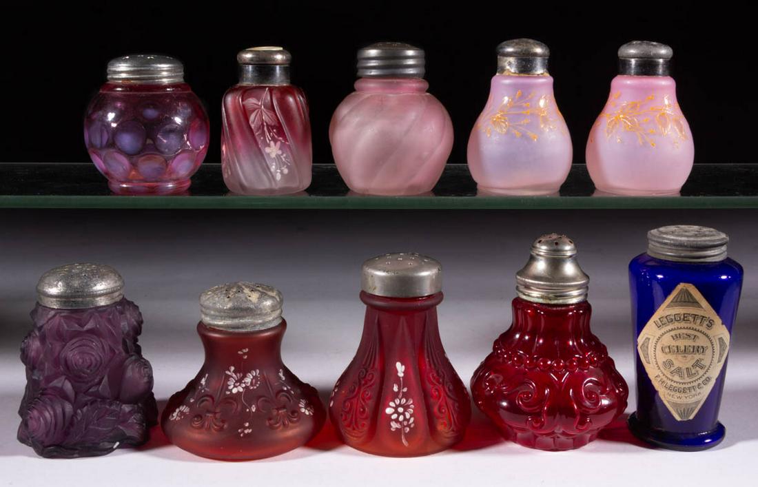 ASSORTED VICTORIAN GLASS SALT AND PEPPER SHAKERS, LOT: ASSORTED VICTORIAN GLASS SALT AND PEPPER SHAKERS, LOT OF TEN, various colors, including a "LEGGETT'S/CELERY/SALT", a Parian Swirl, a Gaudy Rose, and a Globule, each having a period lid. Various makers