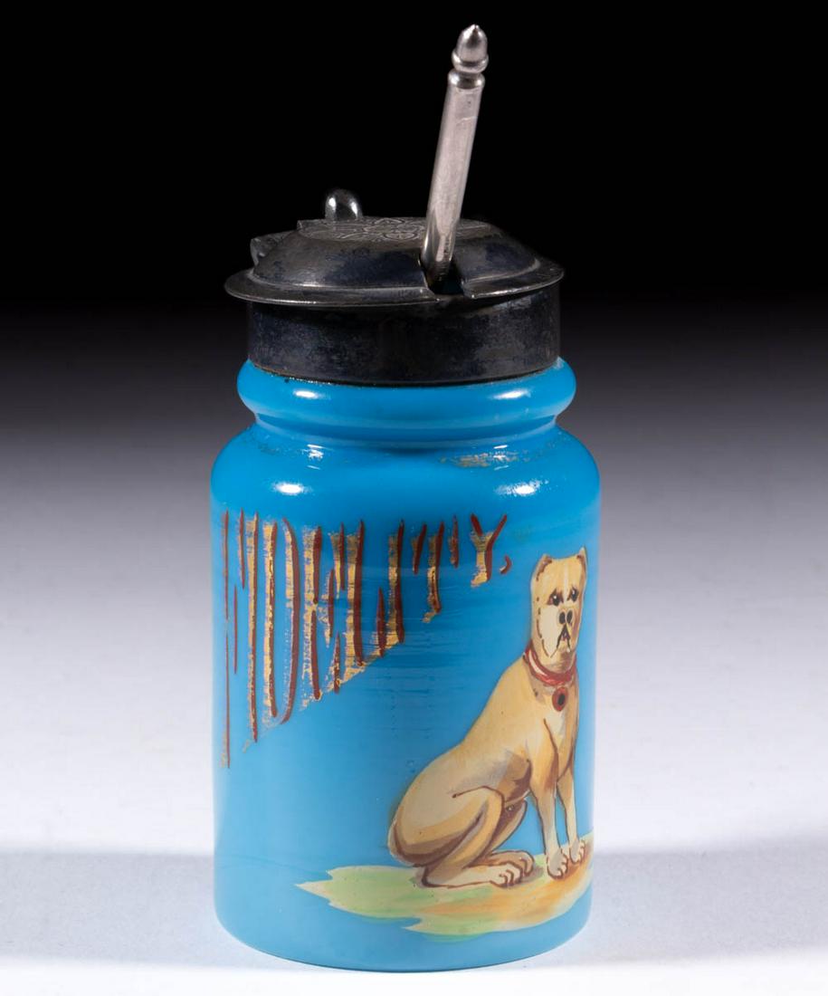 PAIRPOINT "FIDELITY" ENAMEL-DECORATED GLASS MUSTARD POT: PAIRPOINT "FIDELITY" ENAMEL-DECORATED GLASS MUSTARD POT, opaque blue, cylindrical form featuring a dog in a sitting position and stating "FIDELITY", fitted with a quadruple-plated lid with an integral