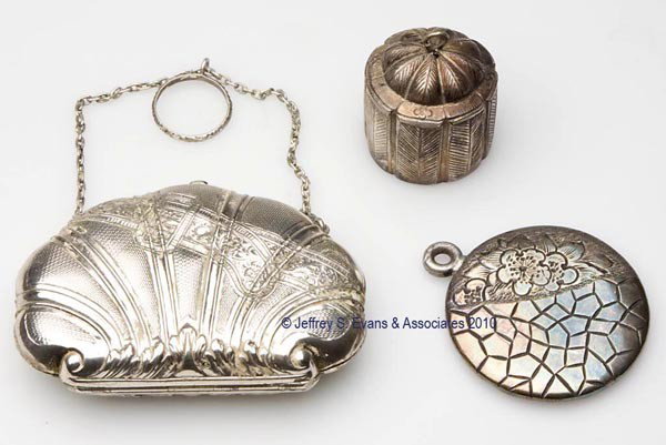 SILVER-LIKE CHATELAINE APPENDAGES, LOT OF THREE: SILVER-LIKE CHATELAINE APPENDAGES, LOT OF THREE, consisting of a purse-form container, interior lined with red silk lining and fitted with a single compartment, suspended on a chain and a single ring,