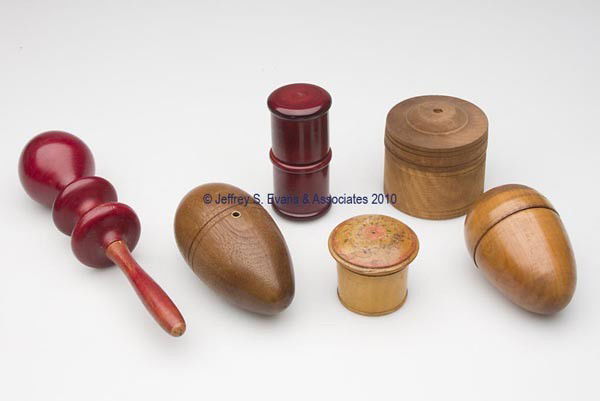 WOODEN SPOOL HOLDERS, LOT OF SIX: WOODEN SPOOL HOLDERS, LOT OF SIX, consisting of two egg forms including one with an eyelet and other with an interior needle case, a rosewood darner with interior needle case and spool reel to exterio