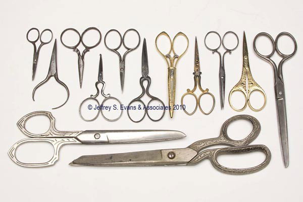 STEEL AND GILDED SCISSORS, LOT OF 13: STEEL AND GILDED SCISSORS, LOT OF 13, consisting of three gilded examples, including one fitted in a matching patterned sheath, blades marked "Lunawerk Solingen Germany", and another marked "C. V. H."