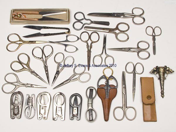 STEEL SCISSORS, LOT OF 26: STEEL SCISSORS, LOT OF 26, consisting of seven fold-up examples including an example with patent information and impressed "MAX", and an English "Cowlishaw Pat No. 13908" fitted in a leather case; 17 
