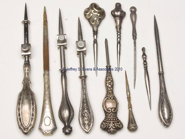 STERLING SILVER AND SILVER-LIKE STILETTOS, LOT OF: STERLING SILVER AND SILVER-LIKE STILETTOS, LOT OF 11, consisting of eight marked sterling silver examples with various floral and scroll embossing, including a Webster, a P & W, and a Simons example w