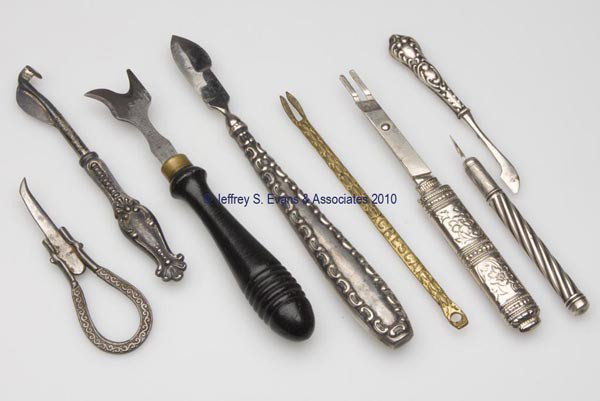 VARIOUS MATERIALS SEAM RIPPER TOOLS, LOT OF EIGHT: VARIOUS MATERIALS SEAM RIPPER TOOLS, LOT OF EIGHT, consisting of two sterling silver examples, a silver-plated example with patent information, a turned wooden handle example with patent information, 
