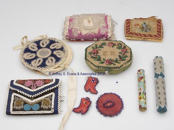 HANDMADE BEADED NEEDLE CASES, LOT OF SEVEN: HANDMADE BEADED NEEDLE CASES, LOT OF SEVEN, various floral and geometric patterns, consisting of five booklet-form examples, including four fitted with wool leaves for needles and one with a pin cushi