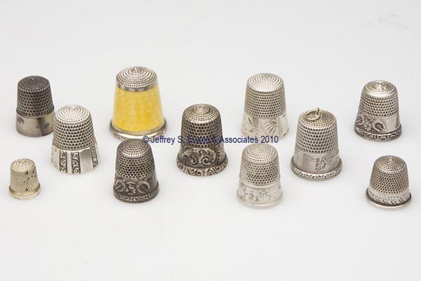 SIMONS BROTHERS AND STERN BROTHERS STERLING SILVER: SIMONS BROTHERS AND STERN BROTHERS STERLING SILVER THIMBLES, LOT OF 11, consisting of three Stern Brothers examples, including two Horseshoes & Four Leaf Clover, each impressed in apex "GOOD LUCK", an