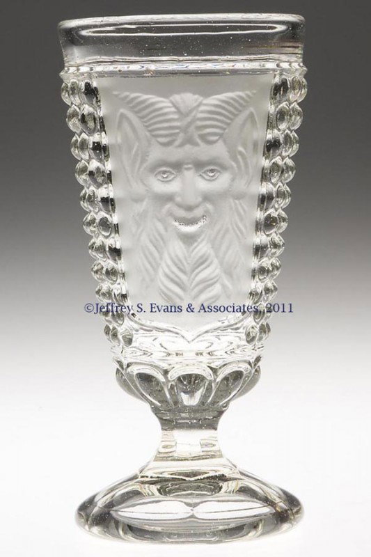 MEPHISTOPHELES ALE GLASS: MEPHISTOPHELES ALE GLASS, colorless and frosted. Fourth quarter 19th century. 6 1/2" H. Provenance: From an Oklahoma collection.