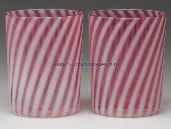 OPALESCENT SWIRL TUMBLERS, LOT OF TWO: OPALESCENT SWIRL TUMBLERS, LOT OF TWO, cranberry opalescent. Full height with factory-polished rim. L. G. Wright/Fenton Art Glass. Second half 20th century. 3 5/8" H.