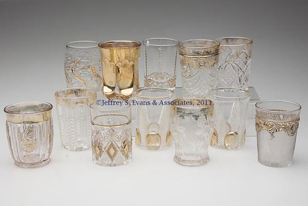 VARIOUS EAPG TUMBLERS, LOT OF 12: VARIOUS EAPG TUMBLERS, LOT OF 12, colorless with gilt decoration, including Japanese Iris, Jewel and Thread, and Star and Crescent, together with nine others. Late 19th/early 20th century. 3 3/4" to 4