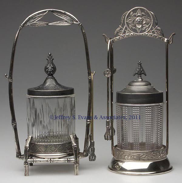 VICTORIAN PICKLE CASTERS, LOT OF TWO: VICTORIAN PICKLE CASTERS, LOT OF TWO, colorless jars, comprising a Belted Icicle jar fitted in a James Tufts quadruple-plate bamboo-design stand, and a Beaded Panel jar fitted in a frame marked only "