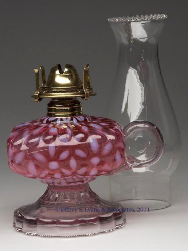 HOBBS' NO. 341 / SNOWFLAKE FOOTED FINGER LAMP: HOBBS' NO. 341 / SNOWFLAKE FOOTED FINGER LAMP, Ruby opalescent/cranberry opalescent font, colorless base, colorless applied handle with pressed feather pattern to lower terminal, No. 1 Taplin Brown co