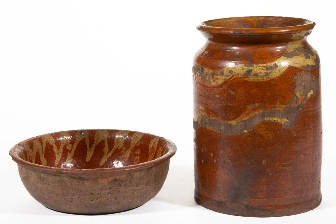 AMERICAN DECORATED EARTHENWARE / REDWARE ARTICLES, LOT: AMERICAN DECORATED EARTHENWARE / REDWARE ARTICLES, LOT OF TWO, lead-glazed, comprising a half-gallon cylindrical form jar with rounded rim and angled shoulder and a 7 3/8" D bowl. Each having yellow-s
