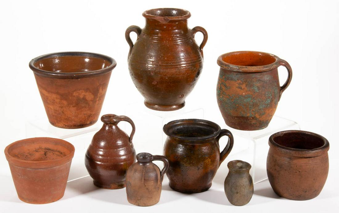 AMERICAN AND OTHER ASSORTED EARTHENWARE / REDWARE: AMERICAN AND OTHER ASSORTED EARTHENWARE / REDWARE ARTICLES, LOT OF NINE, including an impressed "BULWELL / NOTTM / SANKEY / BULWELL" flower pot with drain hole to bottom, a diminutive jug with hand-br
