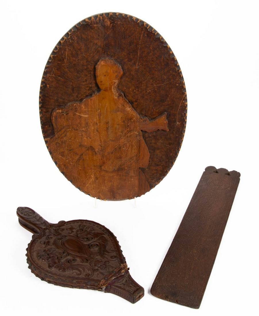 ASSORTED FOLK ART CARVED WOODEN ARTICLES, LOT OF THREE: ASSORTED FOLK ART CARVED WOODEN ARTICLES, LOT OF THREE, comprising a Black Forest bellows featuring the Northwind/Greenman mask and cherubs, pyrography depicting Madame de Pompadour, and a chipped car