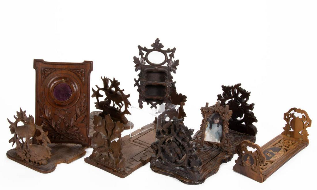 BLACK FOREST CARVED FOLK ART ARTICLES, LOT OF SIX: BLACK FOREST CARVED FOLK ART ARTICLES, LOT OF SIX, (updated 2/22/22) comprising a picture frame with acorns, a hanging wall box, a pocket watch holder, and three book ends, including one with acorns, 