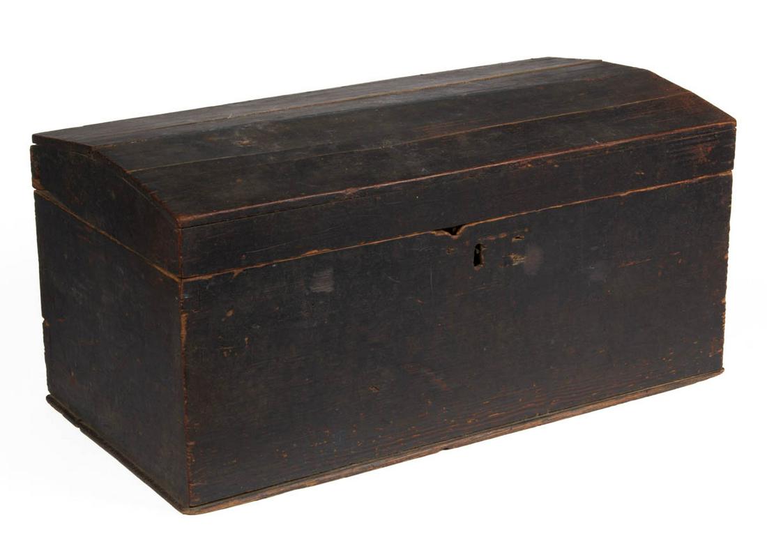 VIRGINIA PAINTED YELLOW PINE DOME-TOP BOX: VIRGINIA PAINTED YELLOW PINE DOME-TOP BOX, hinged lid above dovetailed case. Retains an old black-painted surface. First quarter 19th century. 10 3/4" H, 22" W, 11 1/2" D. Provenance: From the estate 