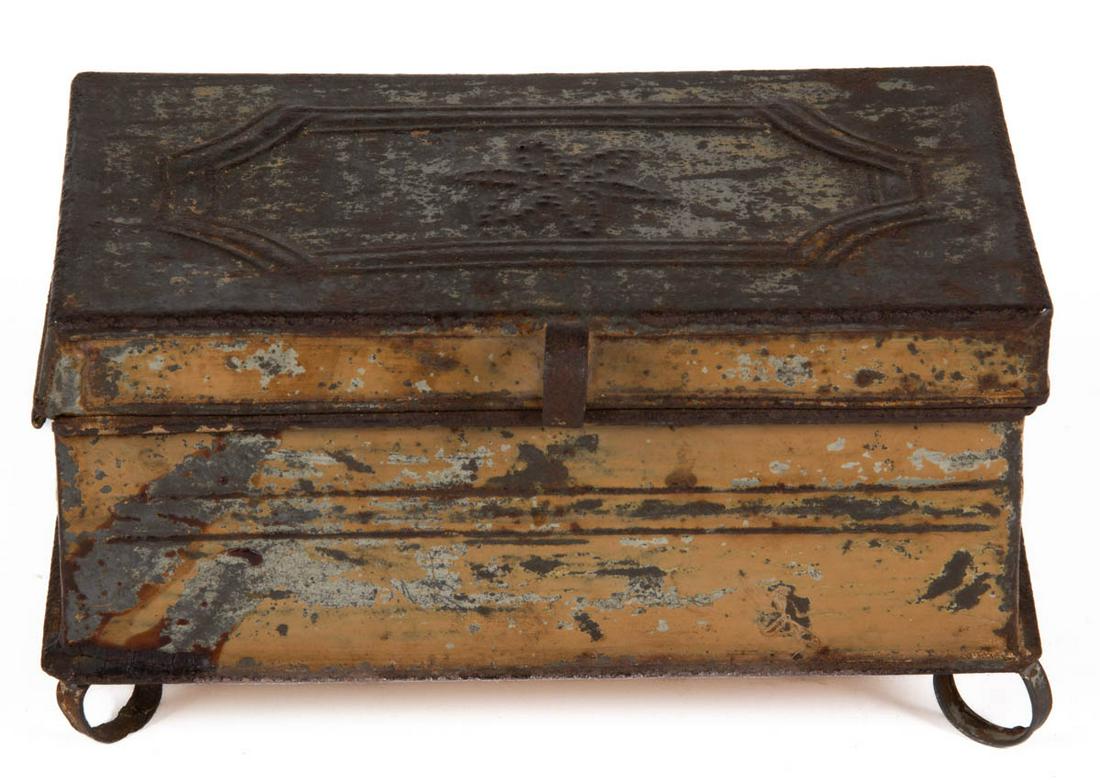 PENNSYLVANIA PAINTED PUNCHED-TIN / WRIGGLEWORK SPICE: PENNSYLVANIA PAINTED PUNCHED-TIN / WRIGGLEWORK SPICE BOX, hinged lid with rosette decoration, concealing divided interior with removable grater, the whole raised on applied circular feet. Retains an o