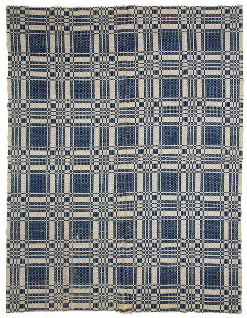 VIRGINIA "QUEEN'S DELIGHT" OVERSHOT COVERLET: VIRGINIA "QUEEN'S DELIGHT" OVERSHOT COVERLET, dark blue wool and natural cotton, two joined panels, having overall grid pattern with squares and rectangles. Second half 19th century. 65 1/2" x 86". Pr