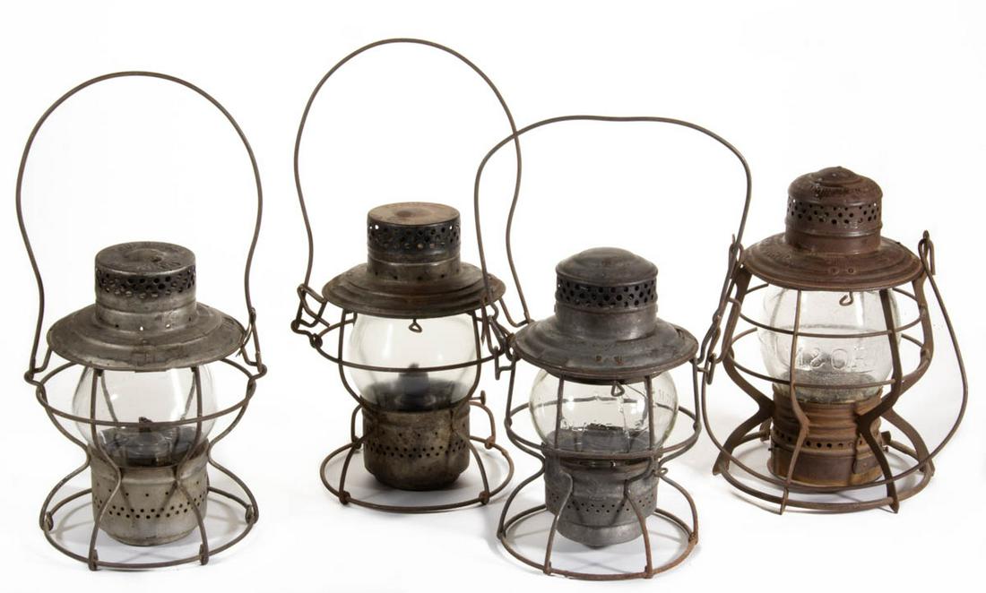 ASSORTED RAILROAD LANTERNS, LOT OF FOUR: ASSORTED RAILROAD LANTERNS, LOT OF FOUR, including one with globe embossed for "M & ORR". First half 20th century. Various sizes. Provenance: From the Dean and Leann Lindsey collection, Phoenix, AZ.