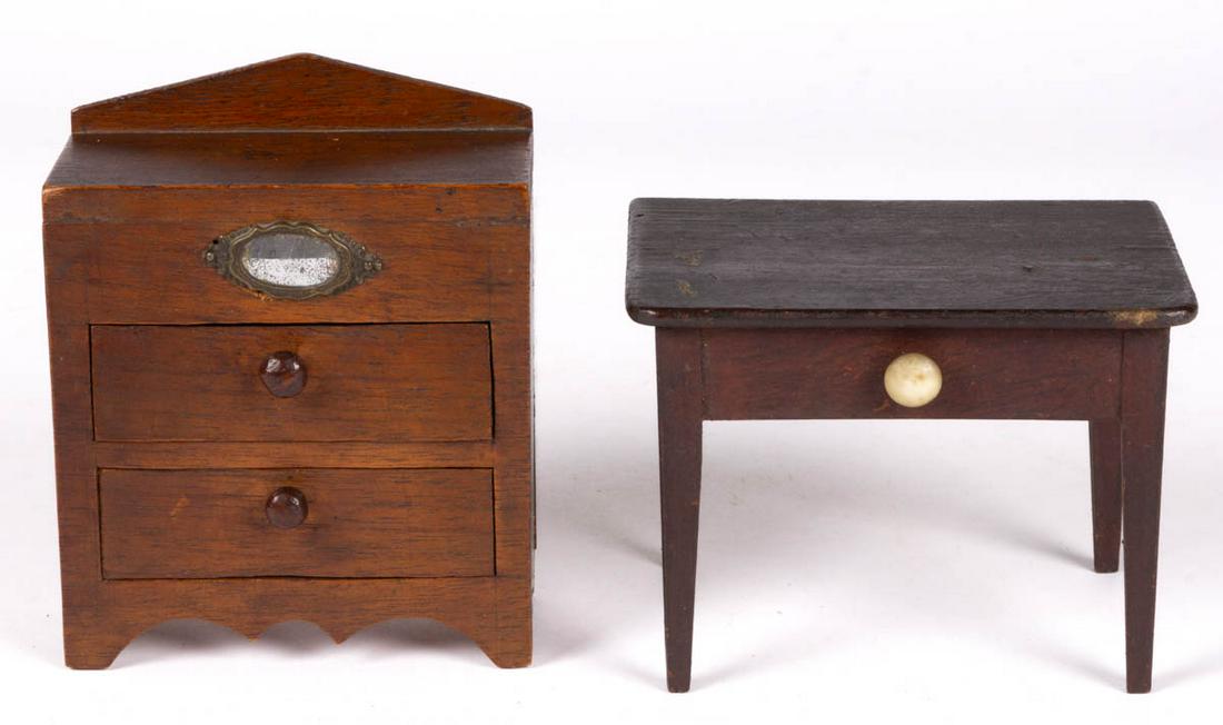 DOLLHOUSE / MINIATURE WOODEN FURNITURE, LOT OF TWO: DOLLHOUSE / MINIATURE WOODEN FURNITURE, LOT OF TWO, comprising a table with painted finish having a rectangular top, a knob to side for a faux drawer, and four tapered legs, and a walnut chest of draw