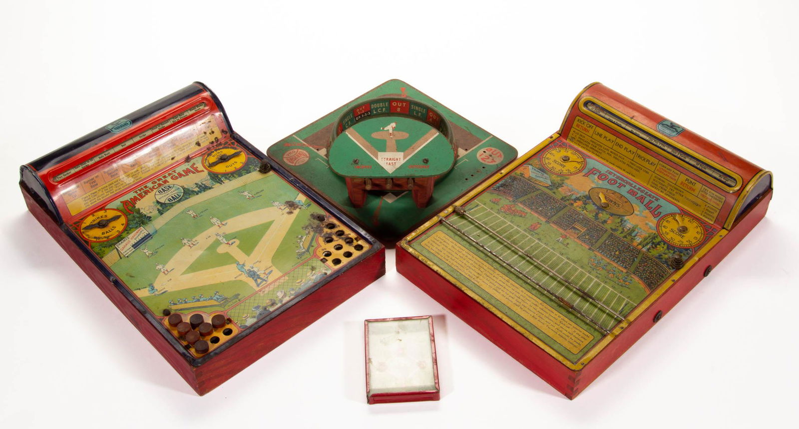 VINTAGE FOOTBALL / BASEBALL GAMES, LOT OF FOUR: VINTAGE FOOTBALL / BASEBALL GAMES, LOT OF FOUR, comprising "INTERCOLLEGIATE FOOTBALL" and "THE GREAT AMERICAN GAME" by Hustler Toy Corporation, "BASES FULL", and "PRO BASEBALL" with roulette-style whe