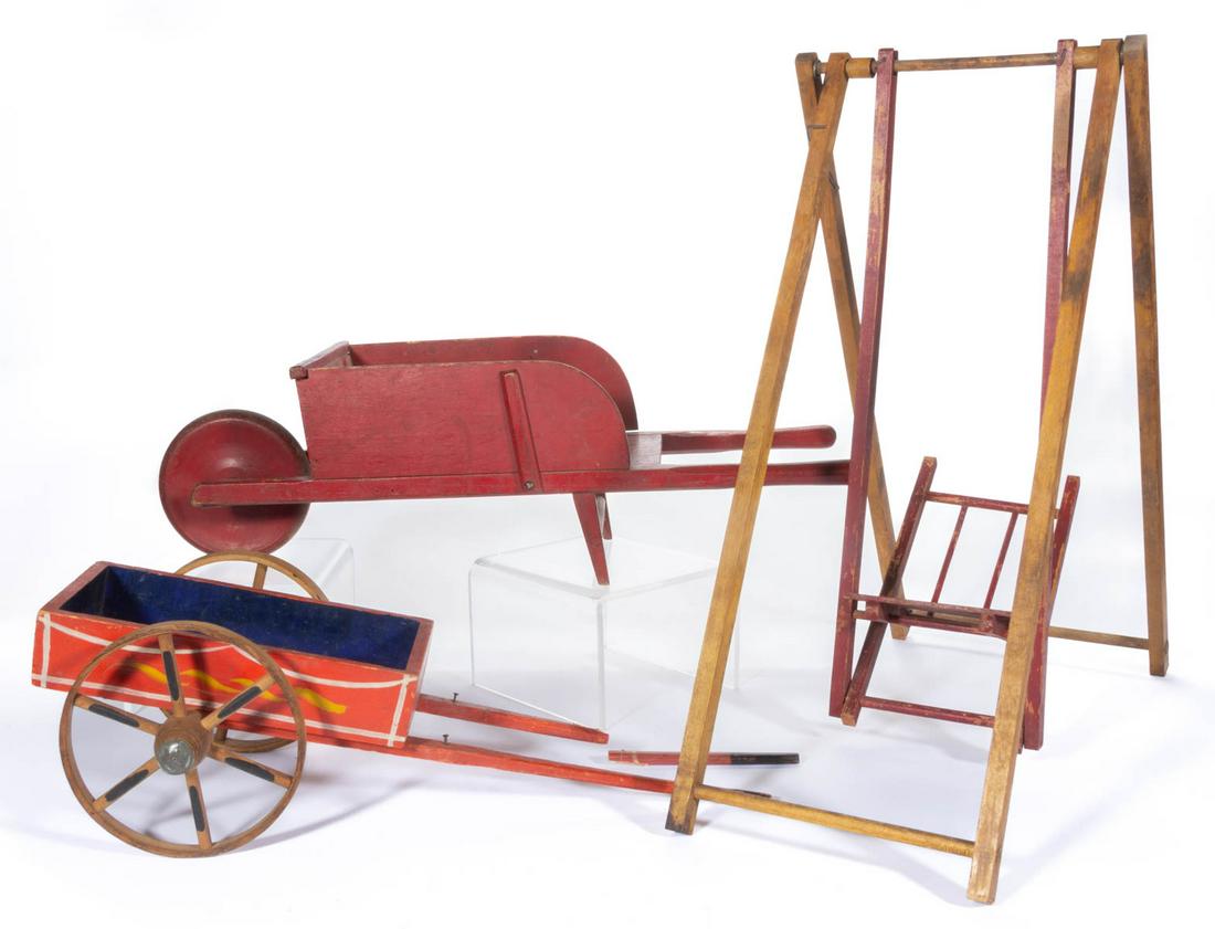 ASSORTED PAINTED WOOD TOYS, LOT OF THREE: ASSORTED PAINTED WOOD TOYS, LOT OF THREE, each having painted finish, comprising a red and yellow swing, a red cart with blue, yellow, white, and black details, and a red wheelbarrow. Late 19th/first