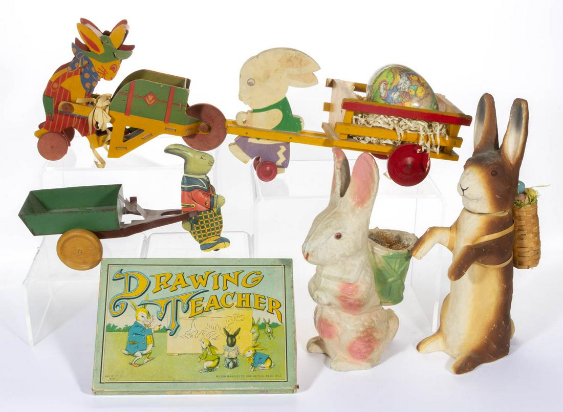 GERMAN AND OTHER EASTER CANDY CONTAINERS AND TOYS, LOT: GERMAN AND OTHER EASTER CANDY CONTAINERS AND TOYS, LOT OF SEVEN, comprising two large papier-mache / composition bunny rabbit candy containers, a German lithographed molded pasteboard egg candy contai