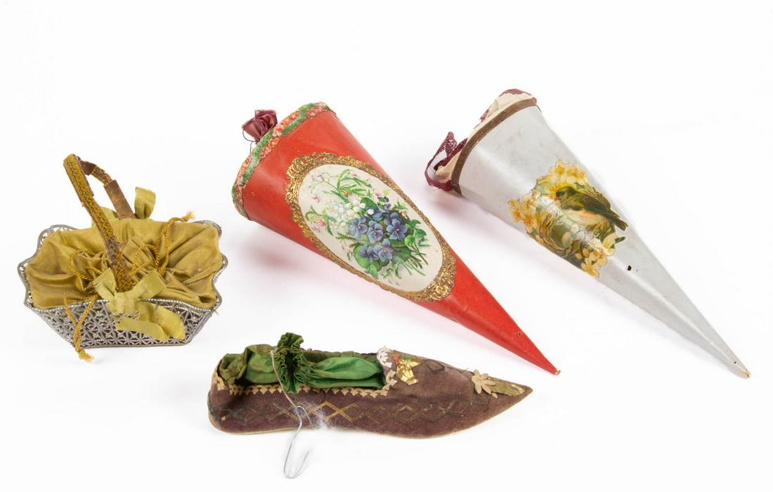 ANTIQUE / VINTAGE HOLIDAY CANDY CONTAINERS, LOT OF FOUR: ANTIQUE / VINTAGE HOLIDAY CANDY CONTAINERS, LOT OF FOUR, comprising a velvet-top shoe example with paper decoration and silk interior lining, a white metal basket example with silk pouch top and a str