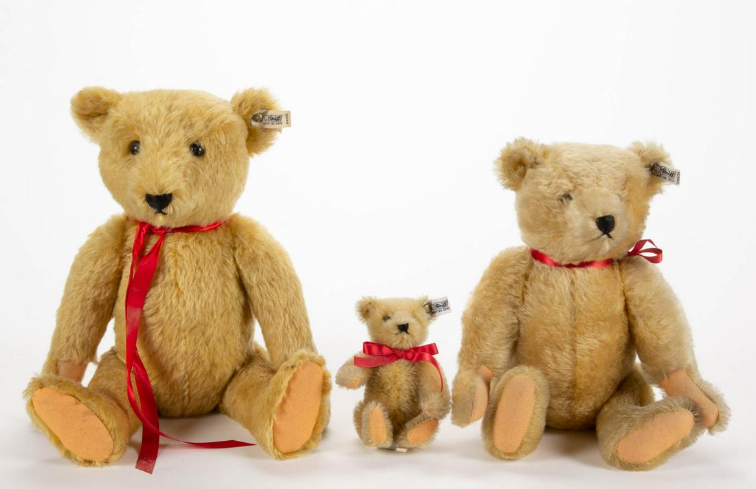 GERMAN STEIFF STUFFED TEDDY BEARS, LOT OF THREE: GERMAN STEIFF STUFFED TEDDY BEARS, LOT OF THREE, blonde mohair, limited edition depicting a family with # 4924 papa, # 7887 mama, and # 7887 baby, each with black eyes and black floss noses, swivel he