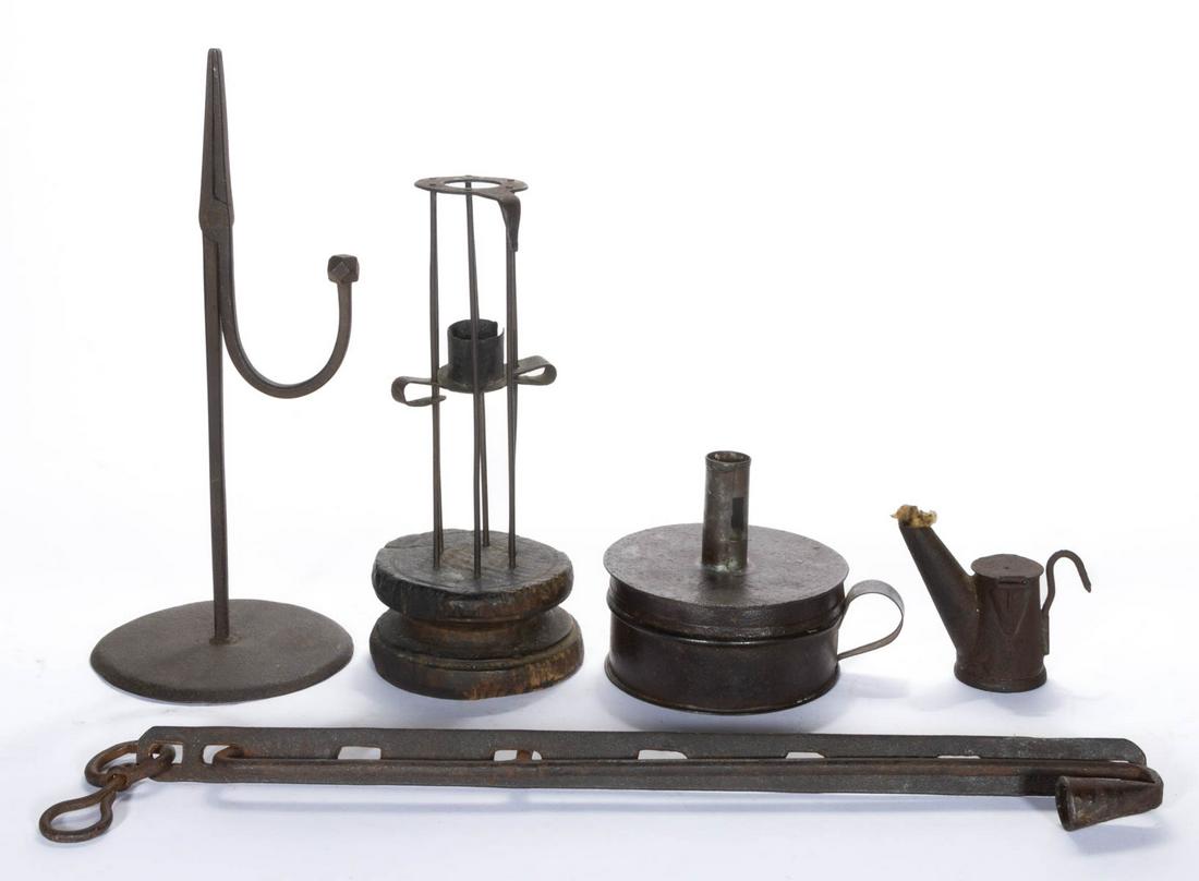 ASSORTED SHEET-IRON AND WROUGHT-IRON LIGHTING ARTICLES,: ASSORTED SHEET-IRON AND WROUGHT-IRON LIGHTING ARTICLES, LOT OF FIVE, comprising an adjustable pendant candle holder with pin construction ratchet; a tinder box in circular form with ribbed ring handle