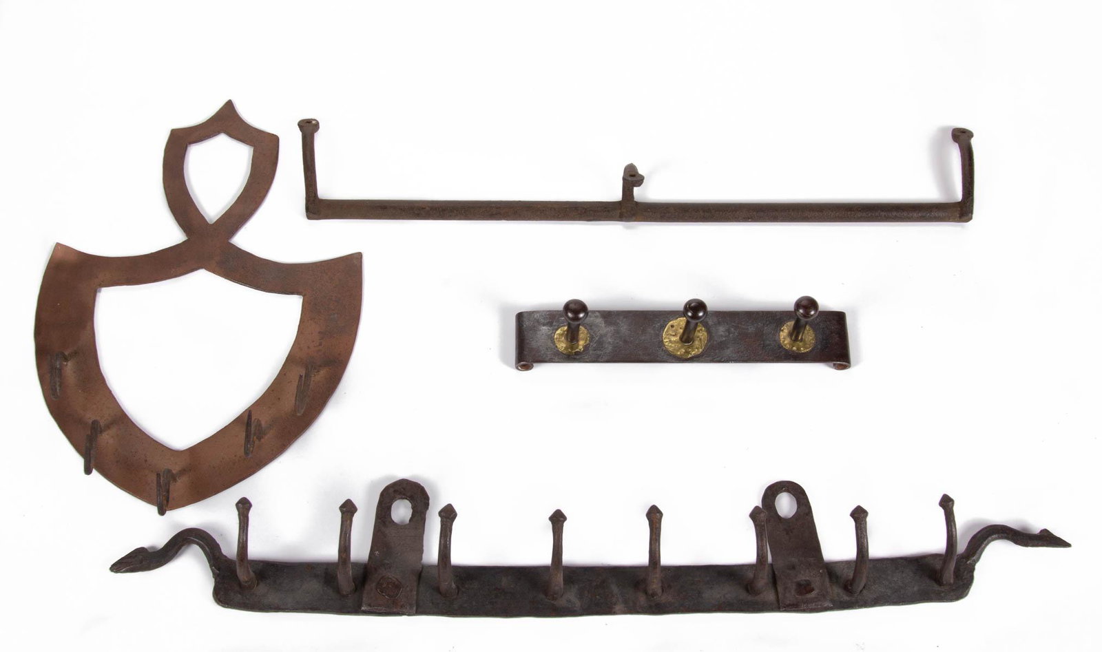 ASSORTED WROUGHT-IRON WALL-MOUNT HANGING RACKS, LOT OF: ASSORTED WROUGHT-IRON WALL-MOUNT HANGING RACKS, LOT OF FOUR, comprising three examples with hooks, including an example with eight ball-tip hooks and figural serpentine ends, a triple-ball-tip hook ex