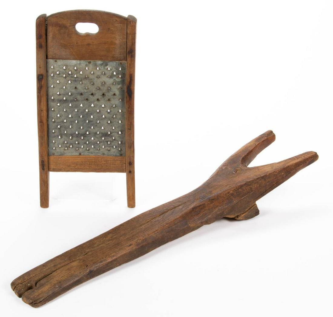 SHENANDOAH VALLEY OF VIRGINIA WHITE OAK AND SHEET-METAL: SHENANDOAH VALLEY OF VIRGINIA WHITE OAK AND SHEET-METAL GRATER, wash board form with cut-out handle. Dry natural surface. Together with a carved wooden boot jack. 19th century. 13" H, 6 1/4" W.Provena