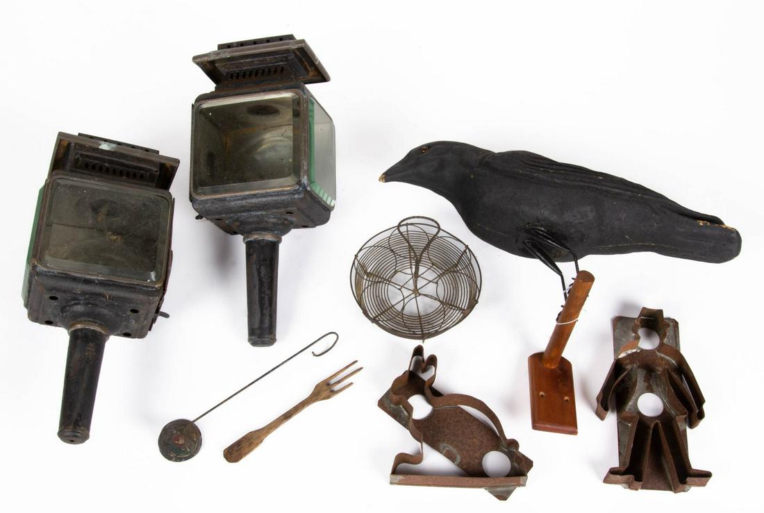 ASSORTED DOMESTIC ARTICLES, LOT OF EIGHT: ASSORTED DOMESTIC ARTICLES, LOT OF EIGHT, including pair of carriage lanterns, wire egg holder, crow decoy, wooden fork, paint-decorated candle snuffer, and figural cookie cutters. Late 19th/20th cent