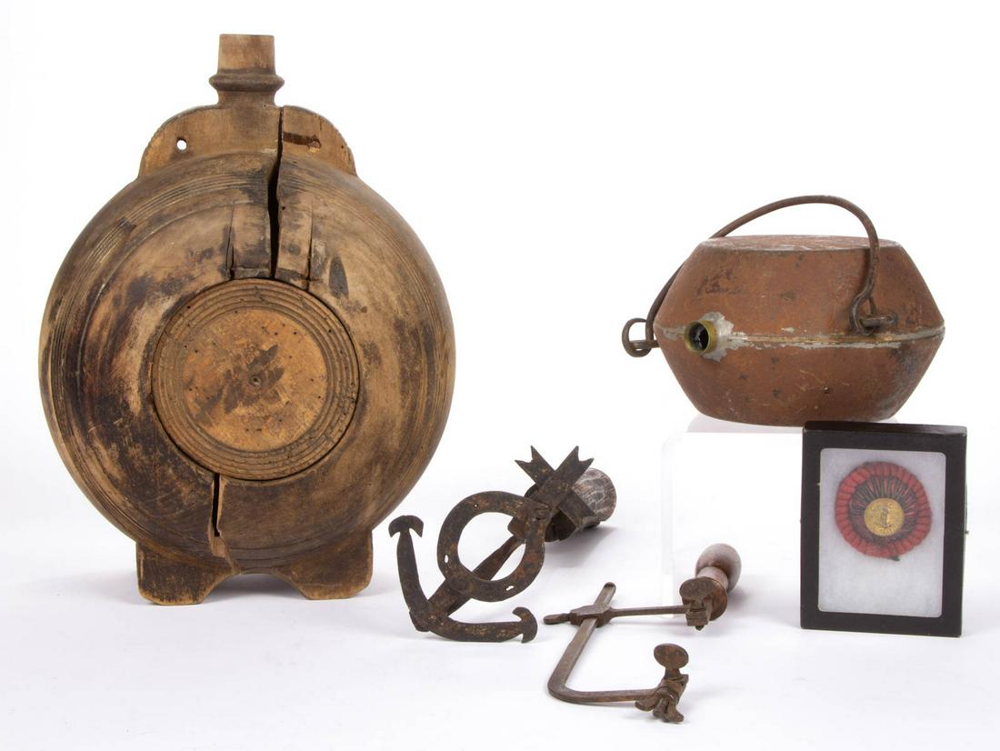 CIVIL WAR AND RELATED ARTICLES, LOT OF FIVE: CIVIL WAR AND RELATED ARTICLES, LOT OF FIVE, including tin medical canteen with bail handle, surgeon saw, and V.M.I. Cadet button. 19th century. Canteen 7" H. Literature: Wooden canteen parallels Lord