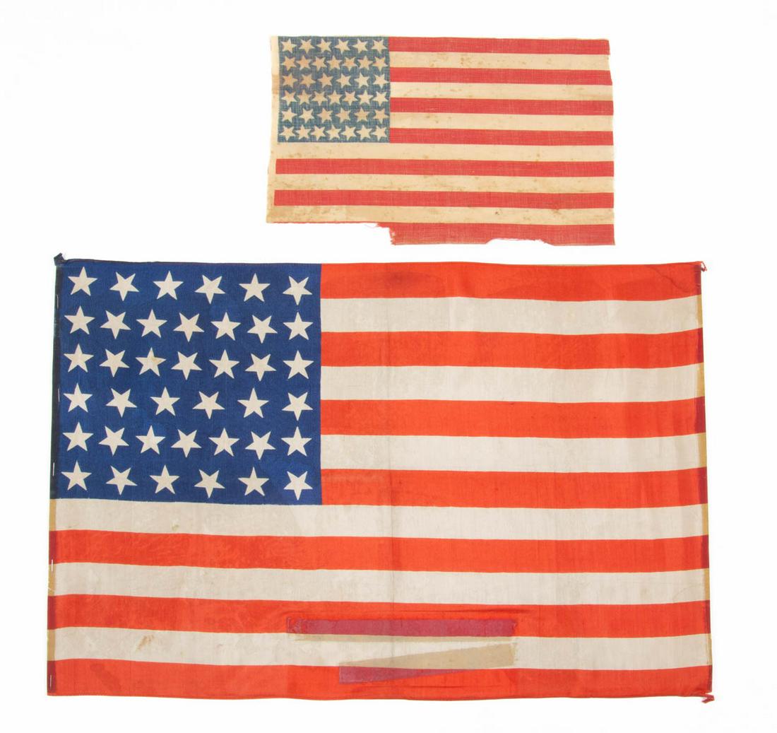 RARE 39-STAR UNOFFICIAL AMERICAN NATIONAL NORTH DAKOTA: RARE 39-STAR UNOFFICIAL AMERICAN NATIONAL NORTH DAKOTA STATEHOOD PARADE FLAG, printed silk, the blue canton featuring six rows of five-pointed stars arranged in a "dancing" pattern of irregular orient