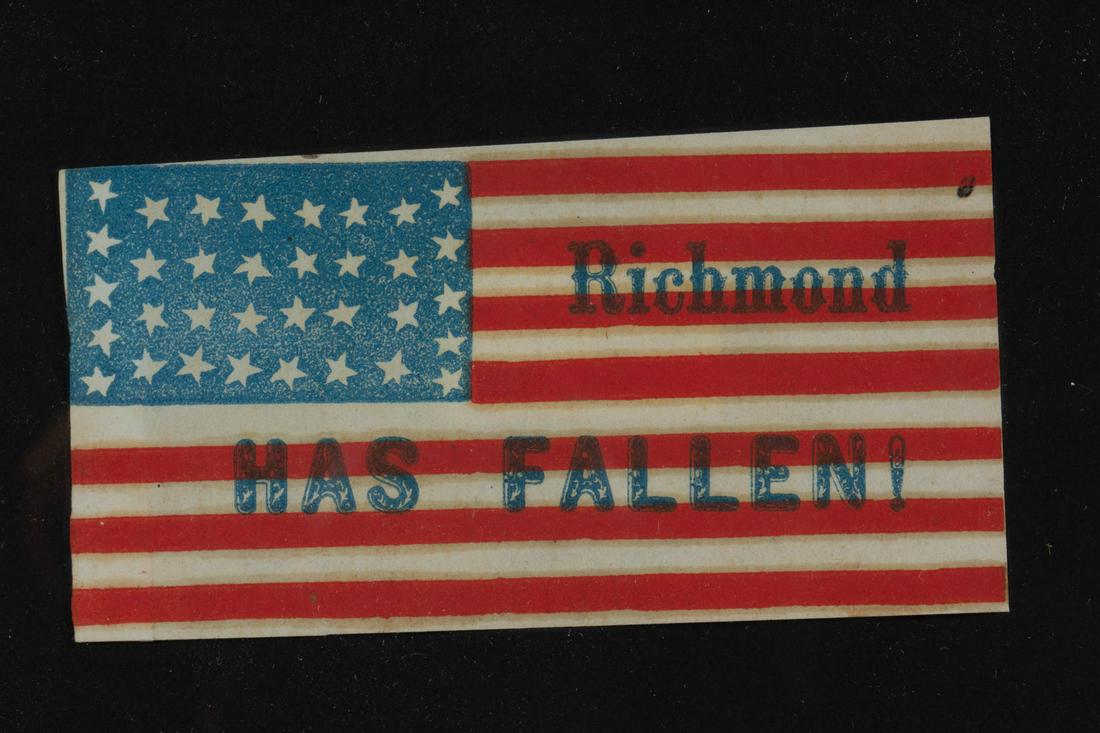 RARE CIVIL WAR COMMEMORATIVE PRINTED PAPER PARADE FLAG: RARE CIVIL WAR COMMEMORATIVE PRINTED PAPER PARADE FLAG, the diminutive form with 34 five-pointed stars on a blue canton, 13 red-and-white stripes bearing "Richmond / HAS FALLEN!" slogan. Housed in a m