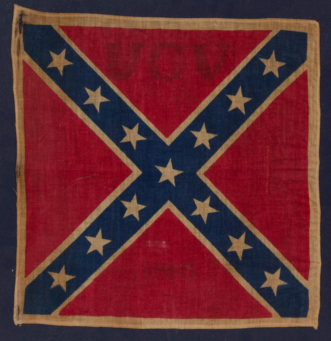 UNITED CONFEDERATE VETERANS / UCV PRINTED PARADE FLAG: UNITED CONFEDERATE VETERANS / UCV PRINTED PARADE FLAG, cotton, square form, "St. Andrew's Cross" pattern, bearing printed "UCV" designation with "1895" date. Conservation mounted in a modern frame. Da