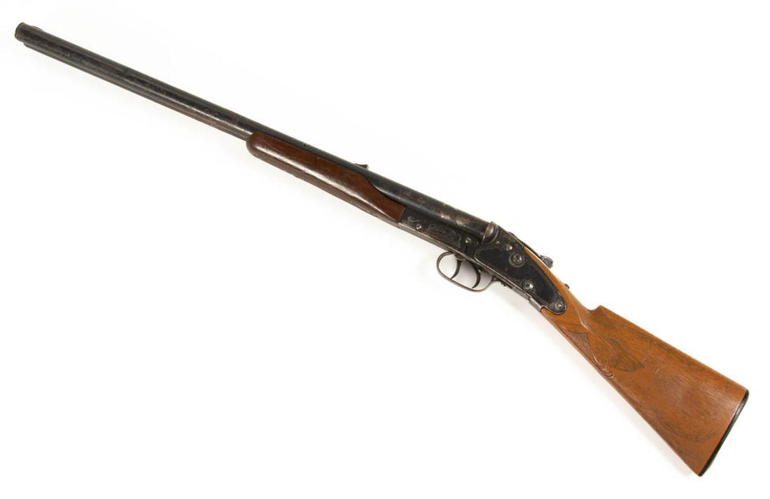 DAISY MODEL NO. 21 DOUBLE-BARREL BB GUN / AIR RIFLE: DAISY MODEL NO. 21 DOUBLE-BARREL BB GUN / AIR RIFLE, faux-wood plastic buttstock and fore end, stamp engraving, barrels and other metal components retaining original surface. Circa 1956. 37 1/2" LOA. 