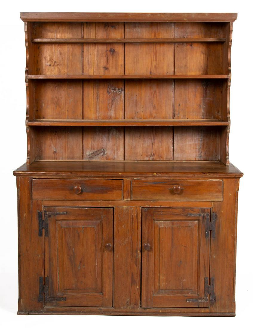 VALLEY OF VIRGINIA YELLOW PINE PEWTER CUPBOARD: VALLEY OF VIRGINIA YELLOW PINE PEWTER CUPBOARD, two-piece construction, top with applied cornice, shaped solid ends flanking three fixed shelves with later plate rests, the lower section having two sh
