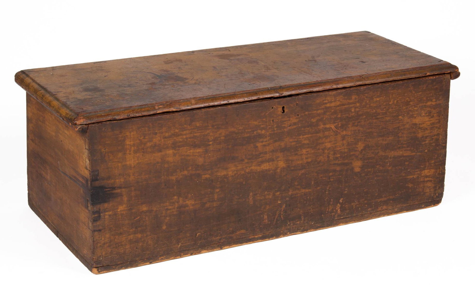 NEW ENGLAND PAINTED PINE SEA CHEST: NEW ENGLAND PAINTED PINE SEA CHEST, cotter-pin hinged rectangular lid above dovetailed case with slanted back panel, interior lacking lidded till. Retains traces of an old mustard-painted surface. Dis