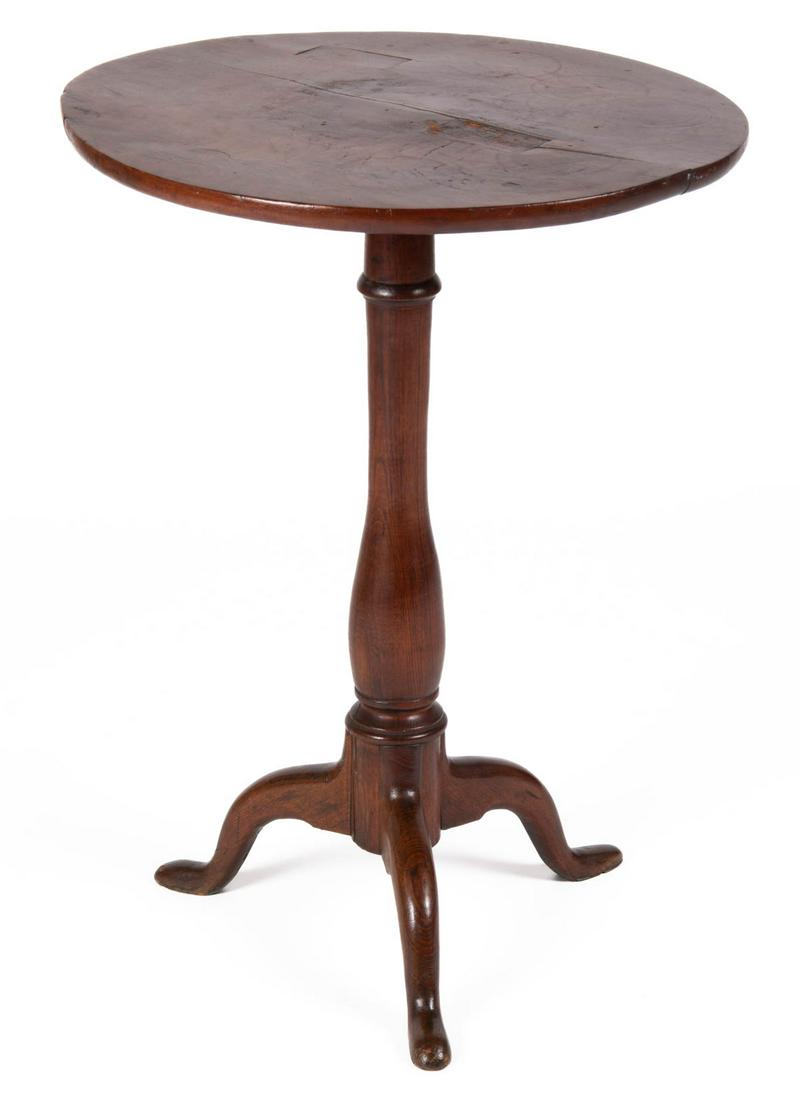 AMERICAN CHIPPENDALE WALNUT CANDLESTAND: AMERICAN CHIPPENDALE WALNUT CANDLESTAND, circular top, above baluster turned standard pedestal, raised on three short cabriole legs, retains wrought-iron "spider" to underside. Old refinished surface 