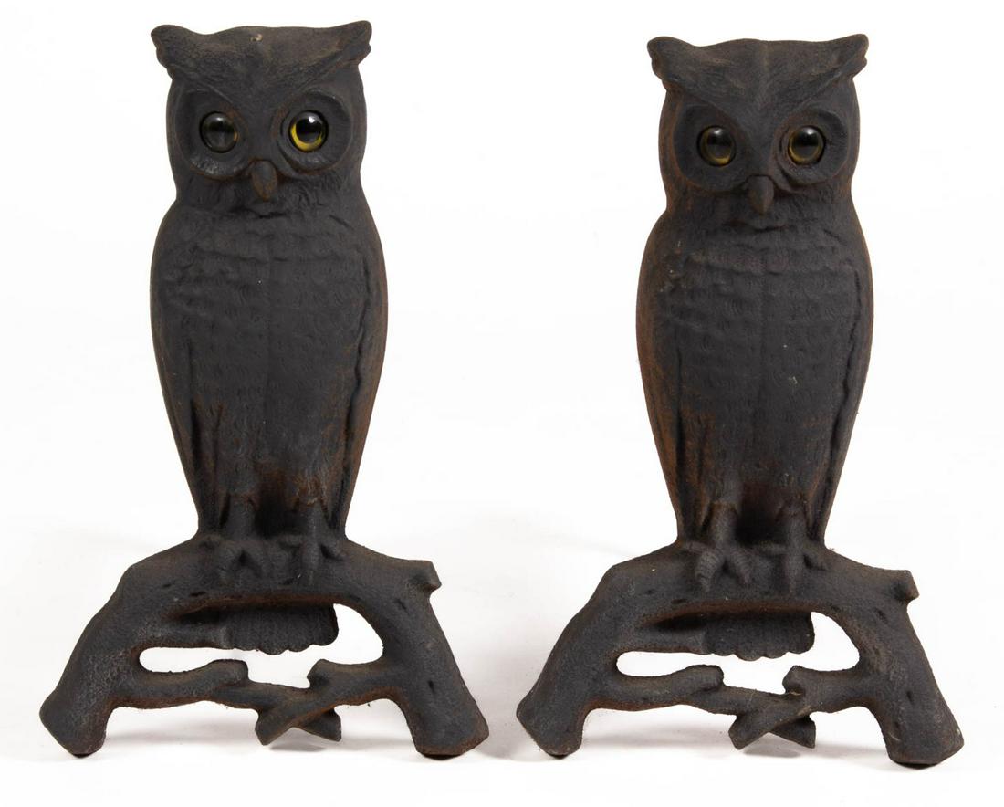 PAIR OF CAST-IRON FIGURAL OWL ANDIRONS: PAIR OF CAST-IRON FIGURAL OWL ANDIRONS, embossed to the reverse "P.S. & W. Co.", with likely original eyes. 20th century. 15 3/4" H, 18" D. Provenance: Property from the estate of Dale Shomper, German