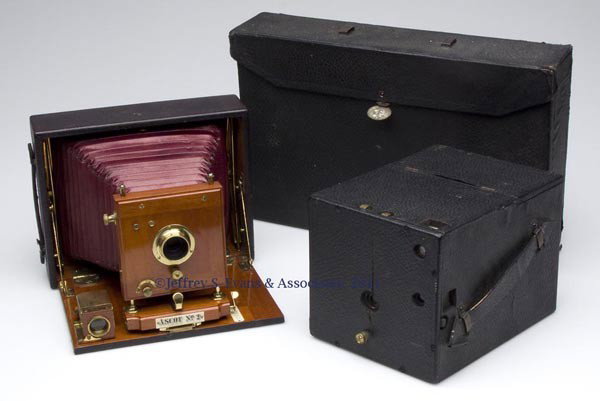 TWO VINTAGE PLATE CAMERAS: TWO VINTAGE PLATE CAMERAS, comprising an Anthony "Ascot No. 2" folding camera with original carrying case and two plates, and an unmarked box camera with side door revealing plates. First quarter 20th