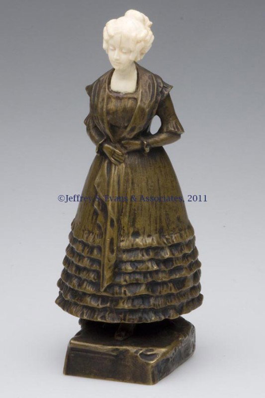 AUSTRIAN BRONZE AND IVORY FIGURE OF A LADY: AUSTRIAN BRONZE AND IVORY FIGURE OF A LADY, illegible artist signature on reverse, AR foundry cipher. First quarter 20th century. 8 1/4" H. Provenance: From a New York estate.